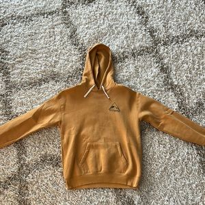 Women’s Billabong hooded sweatshirt, size small. Gold color.